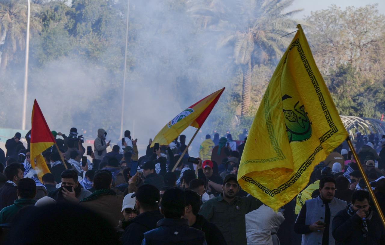 Protesters gather outside the Green Zone, where the US Embassy is located in Baghdad, Iraq, to protest after the announcement of the death of Iranian leader Ayatollah Ali Khamenei, March 1, 2026. (AA Photo)