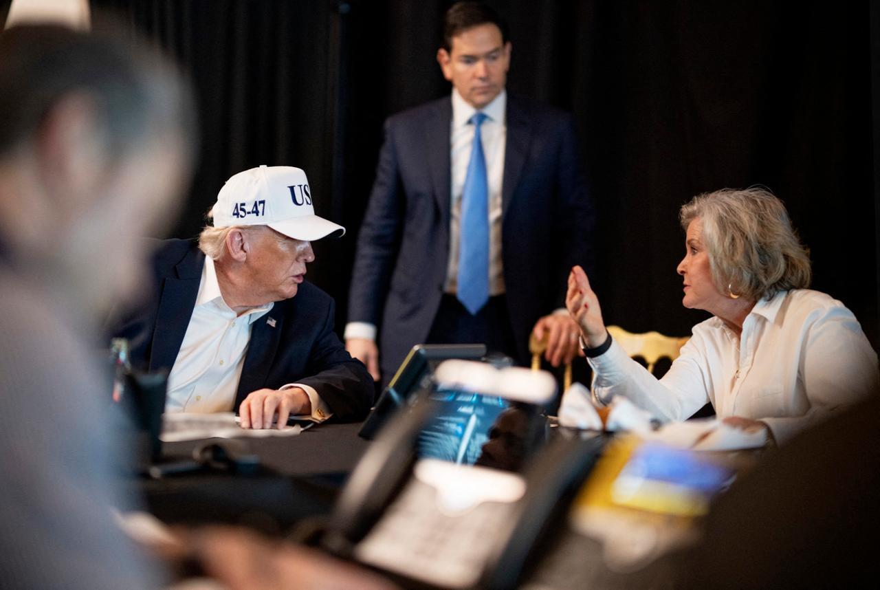 US President Donald Trump (2L), speaking to White House Chief of Staff Susie Wiles (R), watched by US Secretary of State Marco Rubio (C) while monitoring "Operation Epic Fury" activity against Iran, Feb. 28, 2026. (Photo by The White House/AFP)