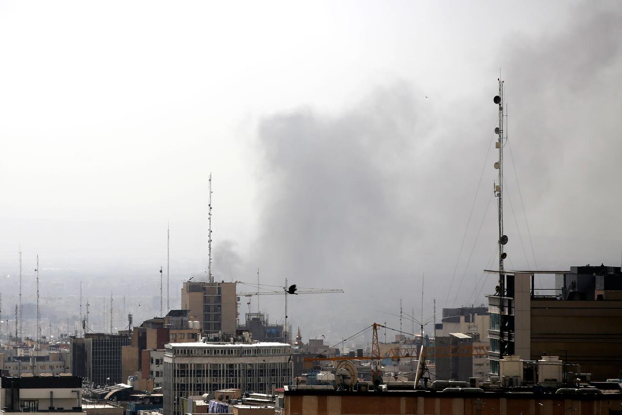 Smoke rises over the city after an Israeli army launches 2nd wave of airstrikes on Iran, February 28, 2026. (AA Photo)