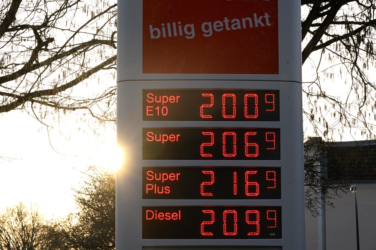 A photo shows an illuminated display showing the prices at a gas station in Essen, Germany on March 9, 2026. (AFP Photo)