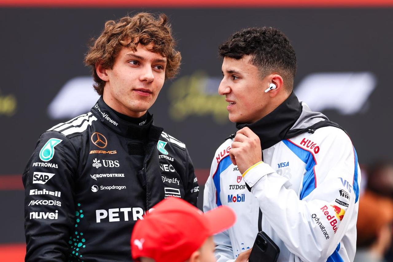 Mercedes rookie Kimi Antonelli (left) speaks with Red Bull driver Isack Hadjar ahead of a Formula 1 session. (Photo via DPPI)