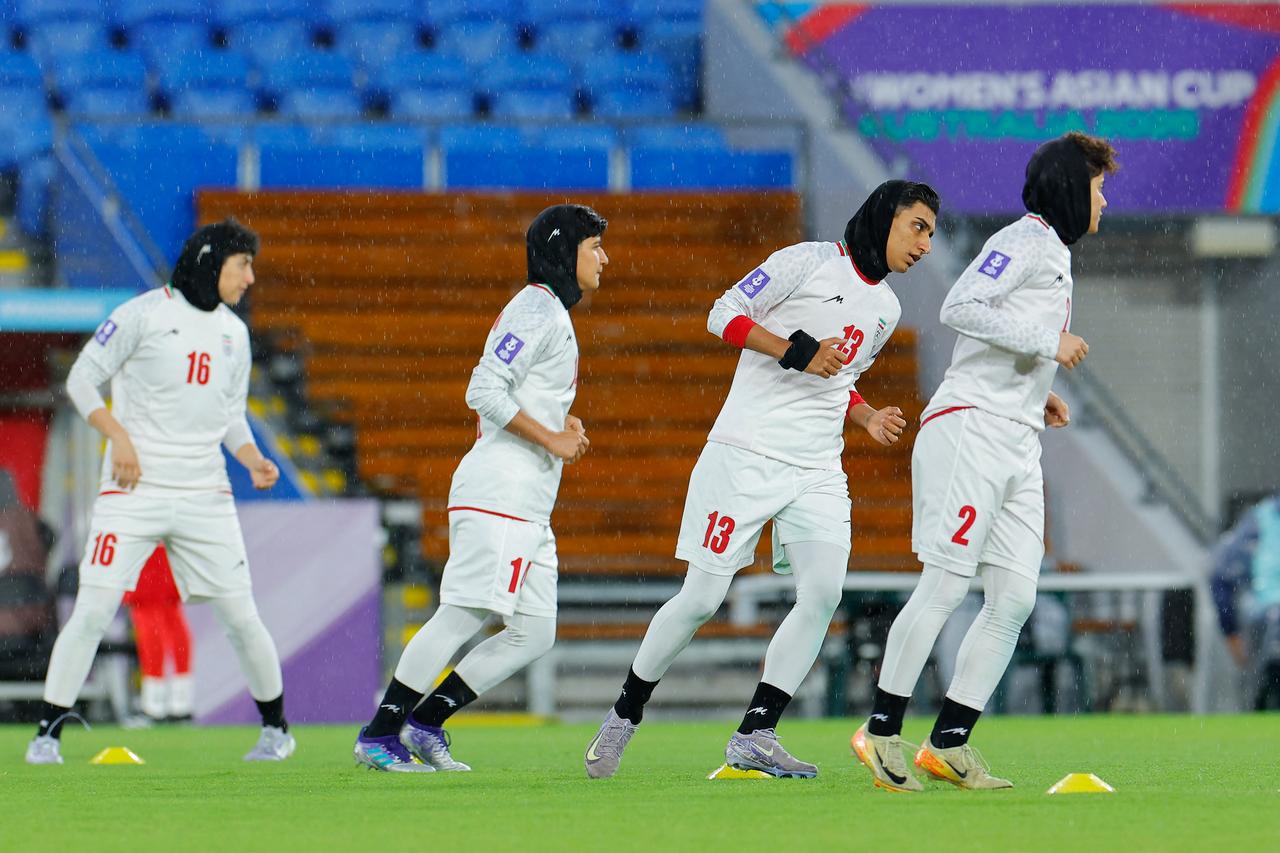 Iranian players warming up before the football match against the Philippines at the AFC Women’s Asian Cup Australia 2026 on the Gold Coast, March 8, 2026. (AFP Photo)
