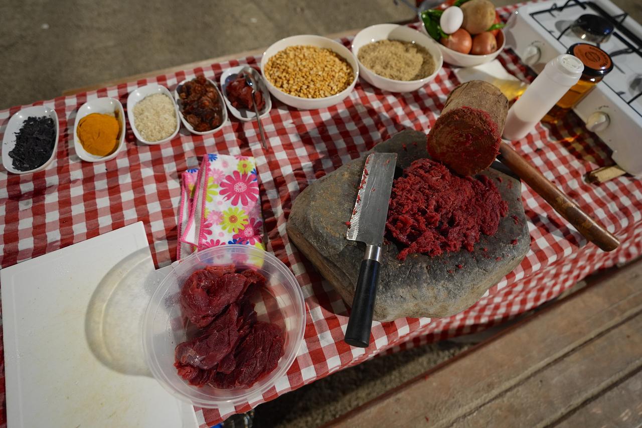 Ingredients used in the preparation of tas kofte, including split chickpeas, rice, spices and hand-pounded beef, are displayed during cooking in Tuzluca district of Igdir, Türkiye, March 10, 2026. (AA Photo)