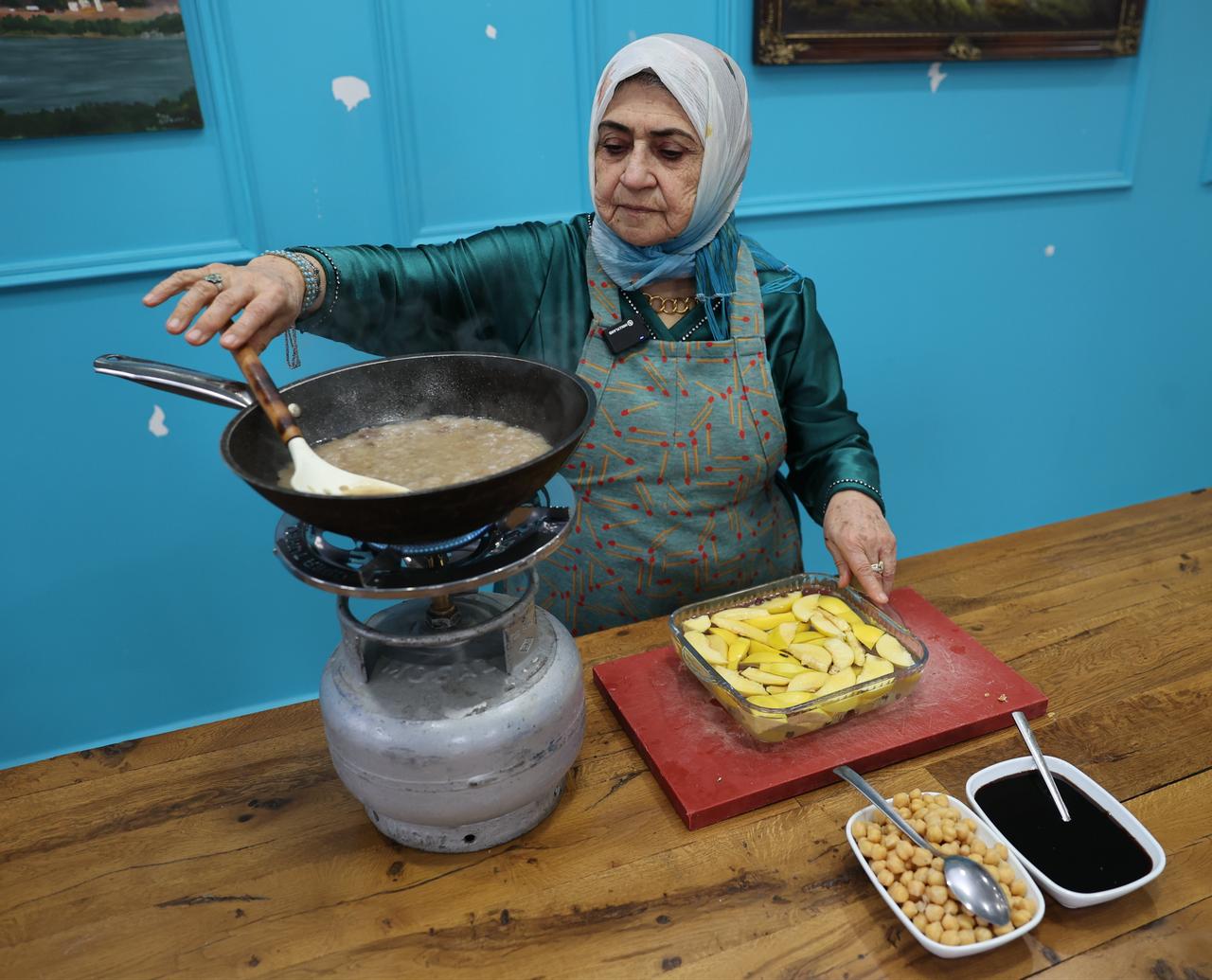 Homemaker Sebiha Sanal shares the traditional recipe for Osmancik quince stew, a local delicacy passed down through generations. Türkiye, March 11, 2026. (AA Photo)