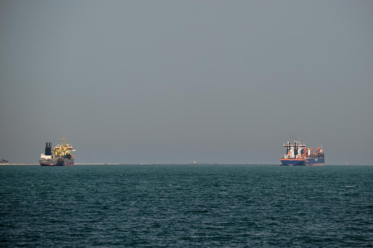 Container ship struck by unknown projectile off UAE coast Image