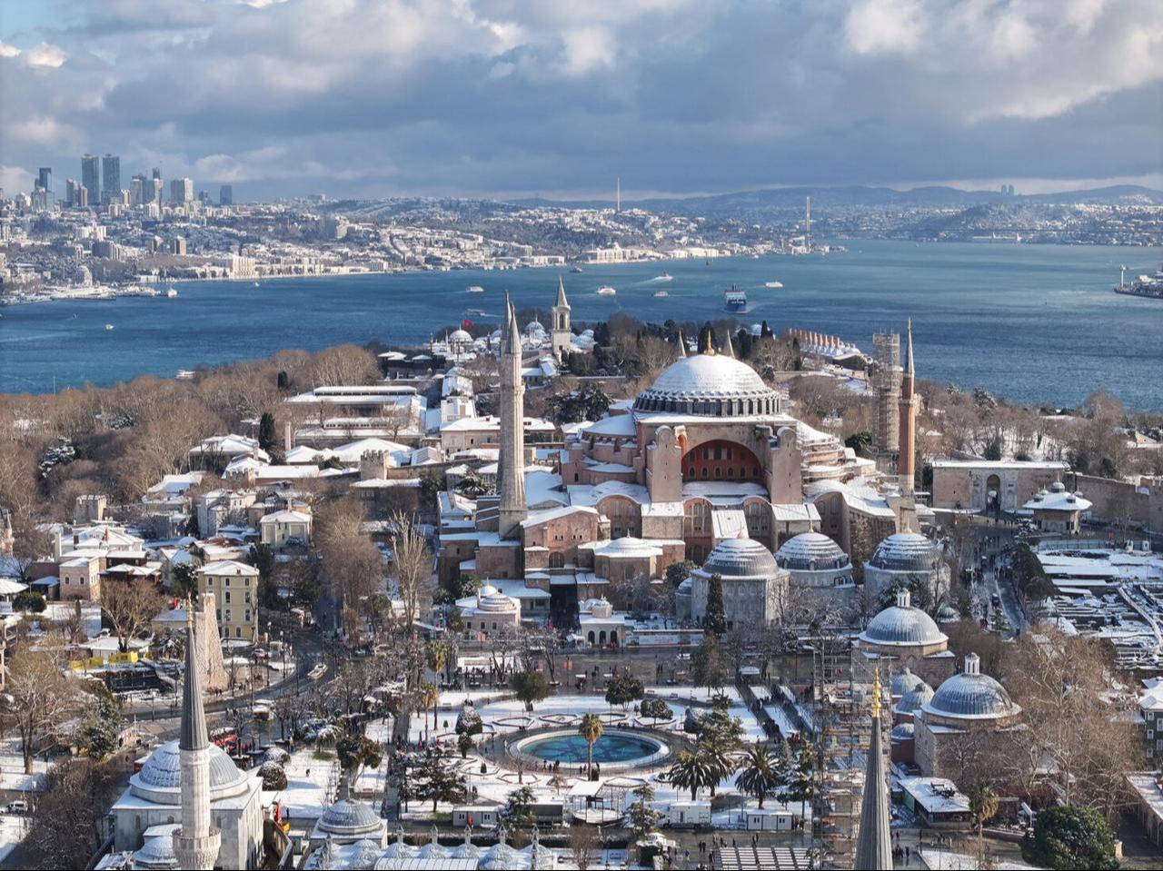 An aerial view of the Hagia Sophia Grand Mosque and its surroundings located in the Sultan Ahmet district as snowfall continues intermittently in Istanbul, Türkiye, Feb. 21, 2025. (AA Photo)