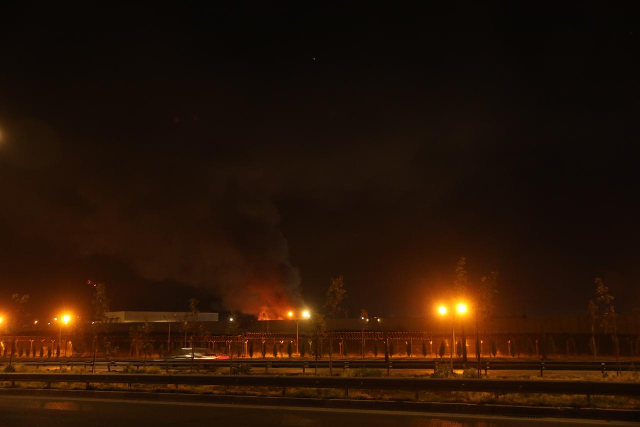 An explosion is reported near the U.S. Consulate and the Erbil International Airport area, with fire breaking out and thick smoke rising following the blast, March 12, 2026. (AA Photo)