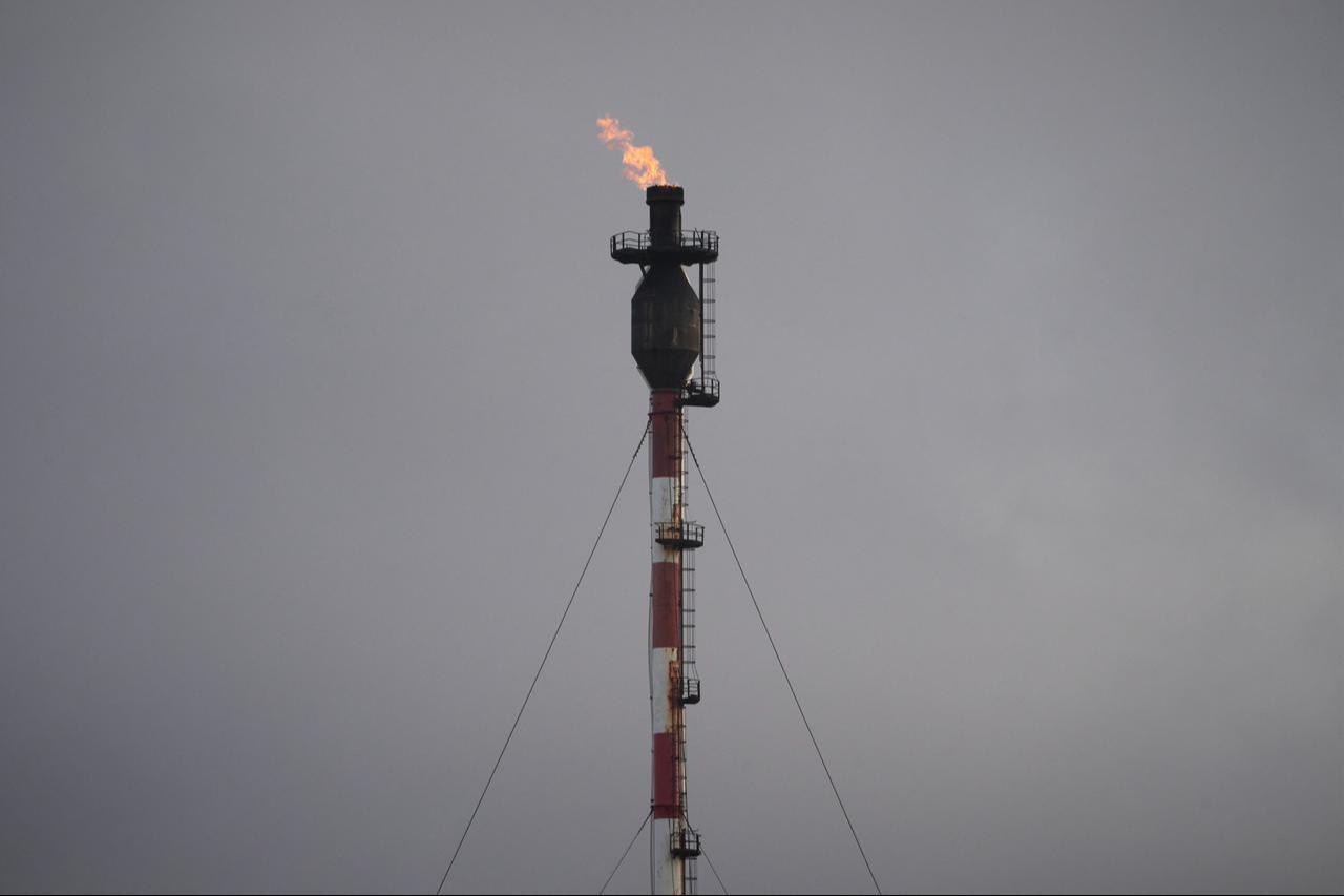 This photograph shows a gas flare at the Repsol oil refinery in A Coruna, northwestern Spain, on March 11, 2026. (AFP Photo)