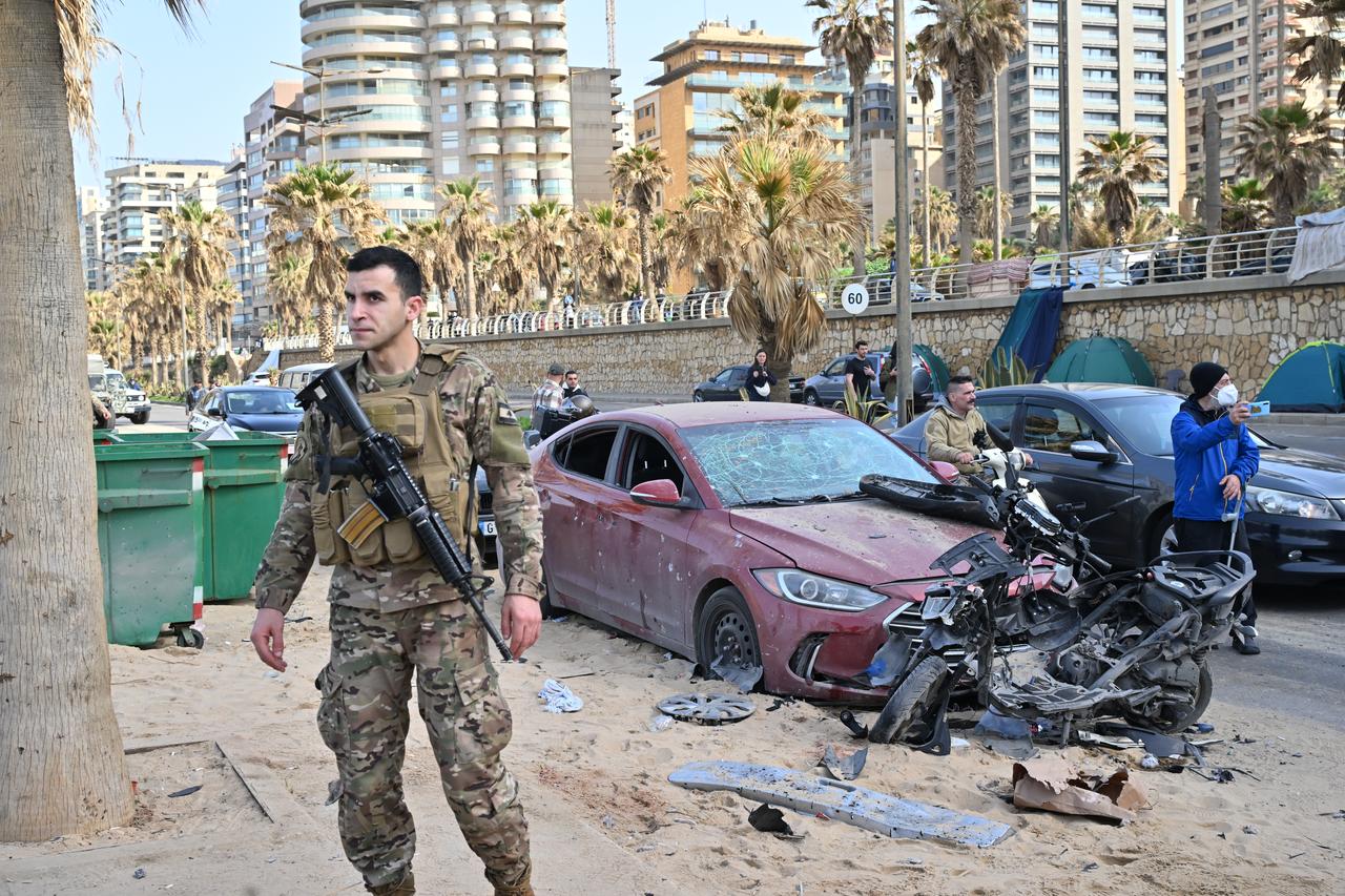 Israeli forces strike the Ramle Beyda area, leaving casualties and causing damage to several vehicles on March 12, 2026, in Beirut, Lebanon. (AA Photo)