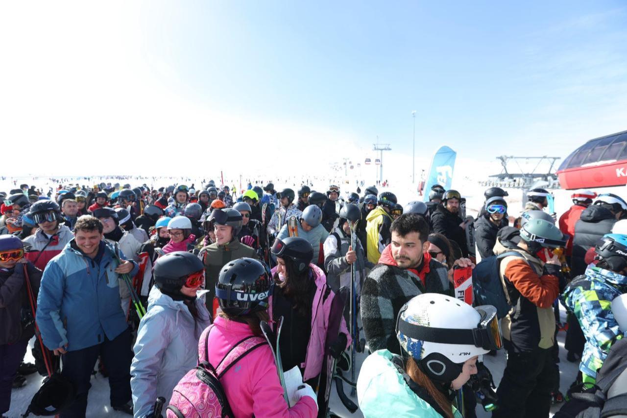 Visitors queue near lift stations at Erciyes Ski Center in Kayseri, Türkiye, Feb. 15, 2026. (AA Photo)