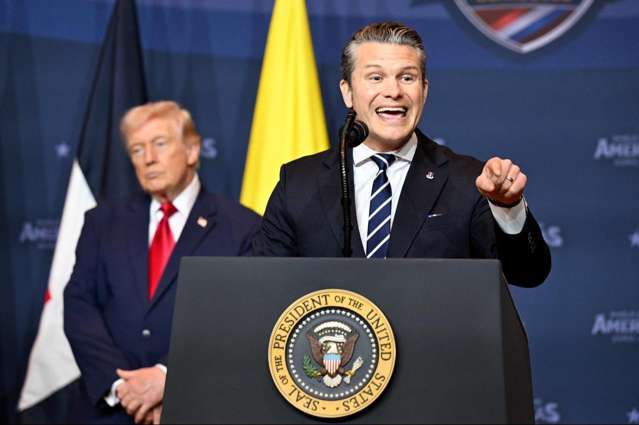 U.S. Secretary of War Pete Hegseth addresses the audience as President Donald Trump listens at the Trump National Doral Golf Club on March 7, 2026, in Doral, Florida. (AFP Photo)