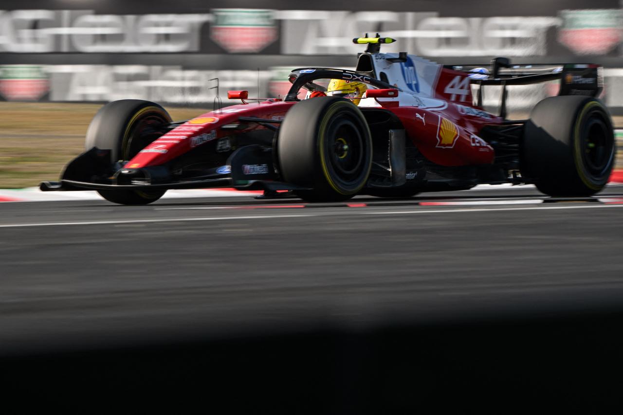 Ferrari's British driver Lewis Hamilton drives during the sprint qualifying session ahead of the Formula One Chinese Grand Prix at the Shanghai International Circuit in Shanghai, March 13, 2026. (AFP Photo)