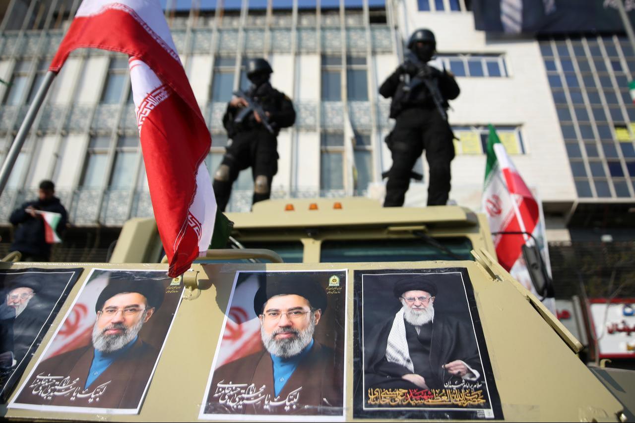 Thousands of people carrying Iranian flags, gather at Enghelab Square to express support for Mojtaba Khamenei, who has become Iran's new supreme leader following Ali Khamenei in Tehran, Iran, March 9, 2026. (AA Photo)