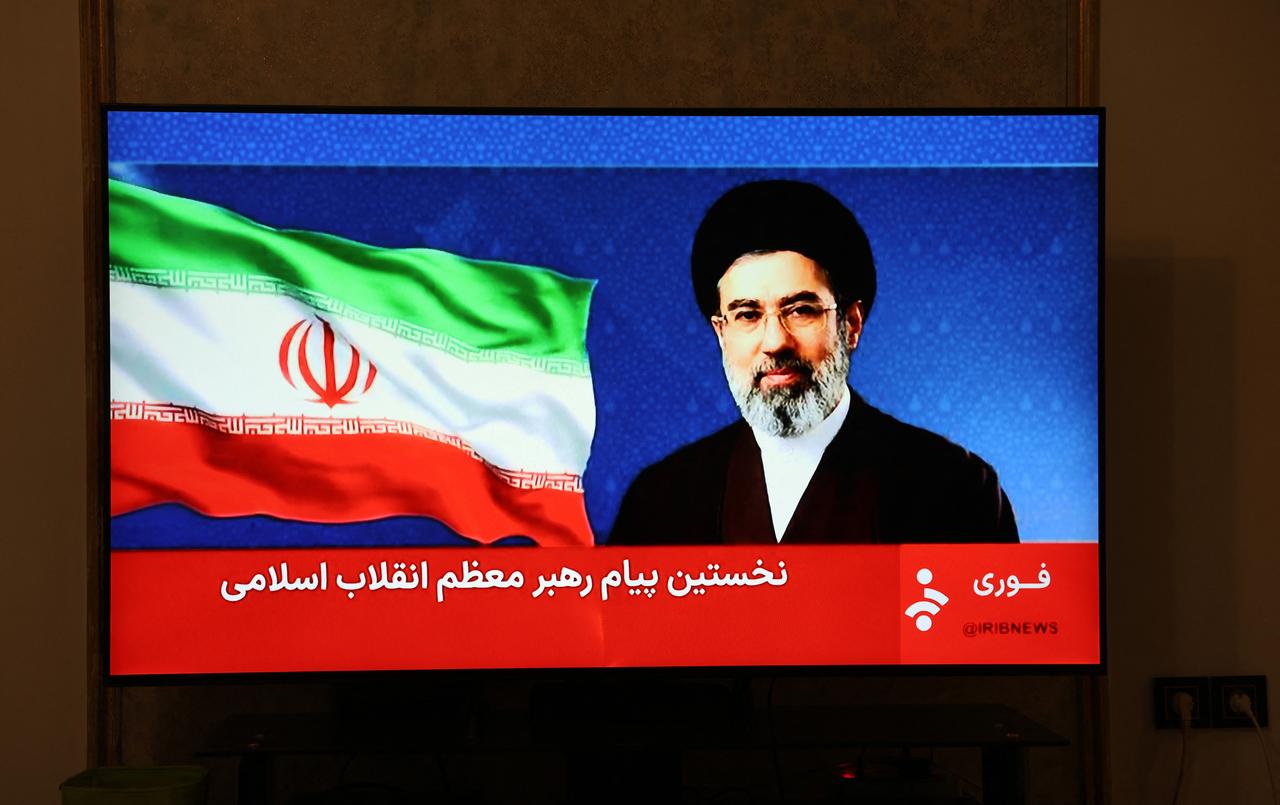This photo, taken in Tehran, shows a statement by Iran's new supreme leader, Mojtaba Khamenei, being televised on March 12, 2026. (AFP Photo)