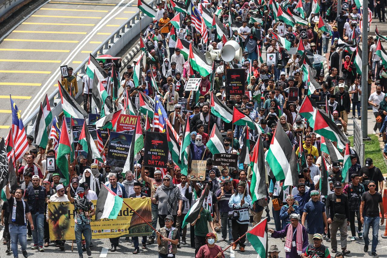 Protesters march towards the US embassy during the Al Quds Rally in solidarity with the Palestinian people, in Kuala Lumpur, Malaysia, April 5, 2024. (Photo via Fazry Ismail)