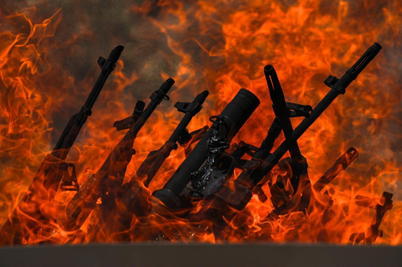 The first group of PKK terrorists, (listed as a terrorist organization by Turkiye, the U.S. and the EU), lays down and destroys their weapons in Sulaymaniyah, northern Iraq on July 11, 2025. (AA Photo)