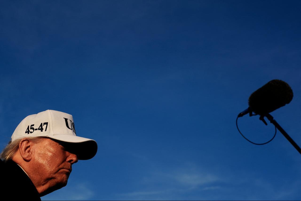 U.S. President Donald Trump takes questions from the media before boarding Air Force One on March 13, 2026 at Joint Base Andrews, Maryland. (AFP Photo)