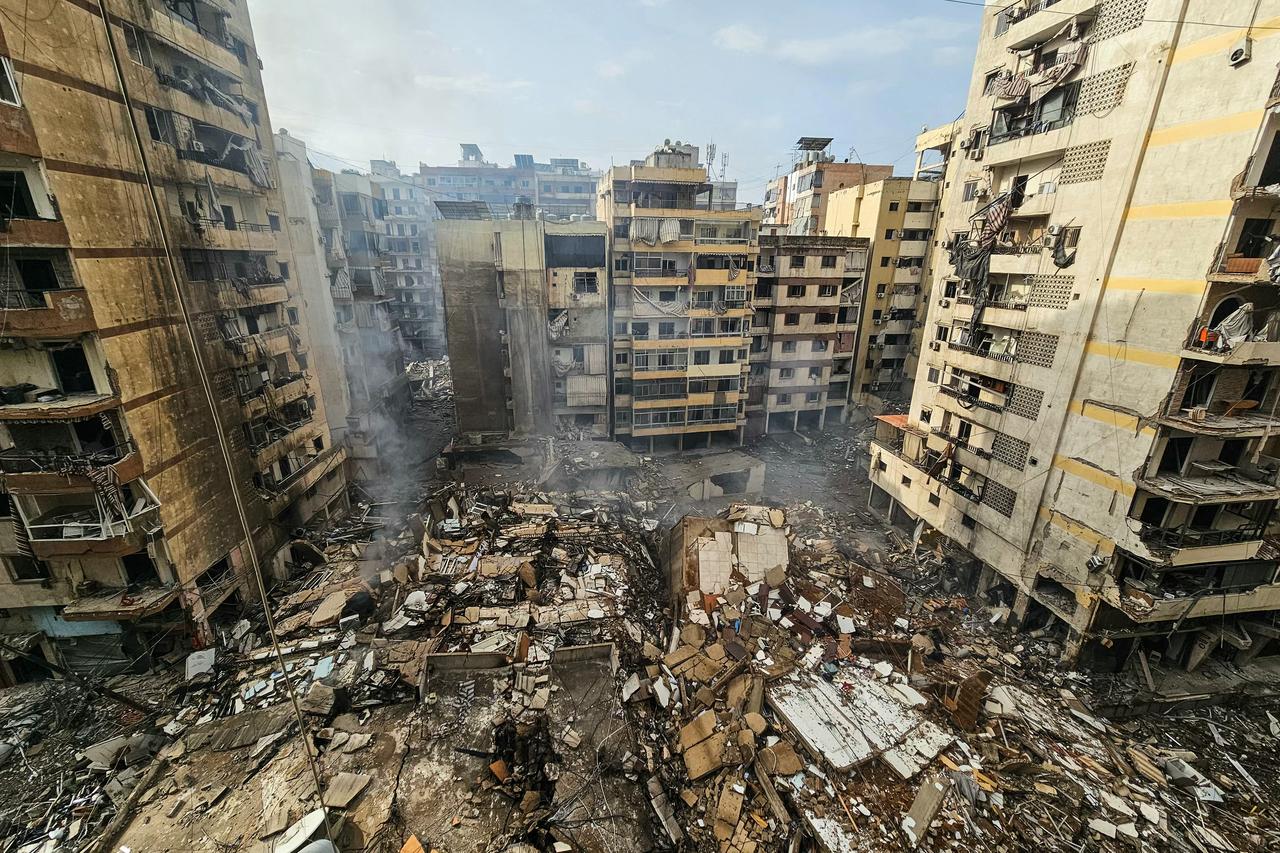 A photograph shows the site of an overnight Israeli airstrike that targeted the Haret Hreik neighbourhood of Beirut’s southern suburbs, March 14, 2026. (AFP Photo)