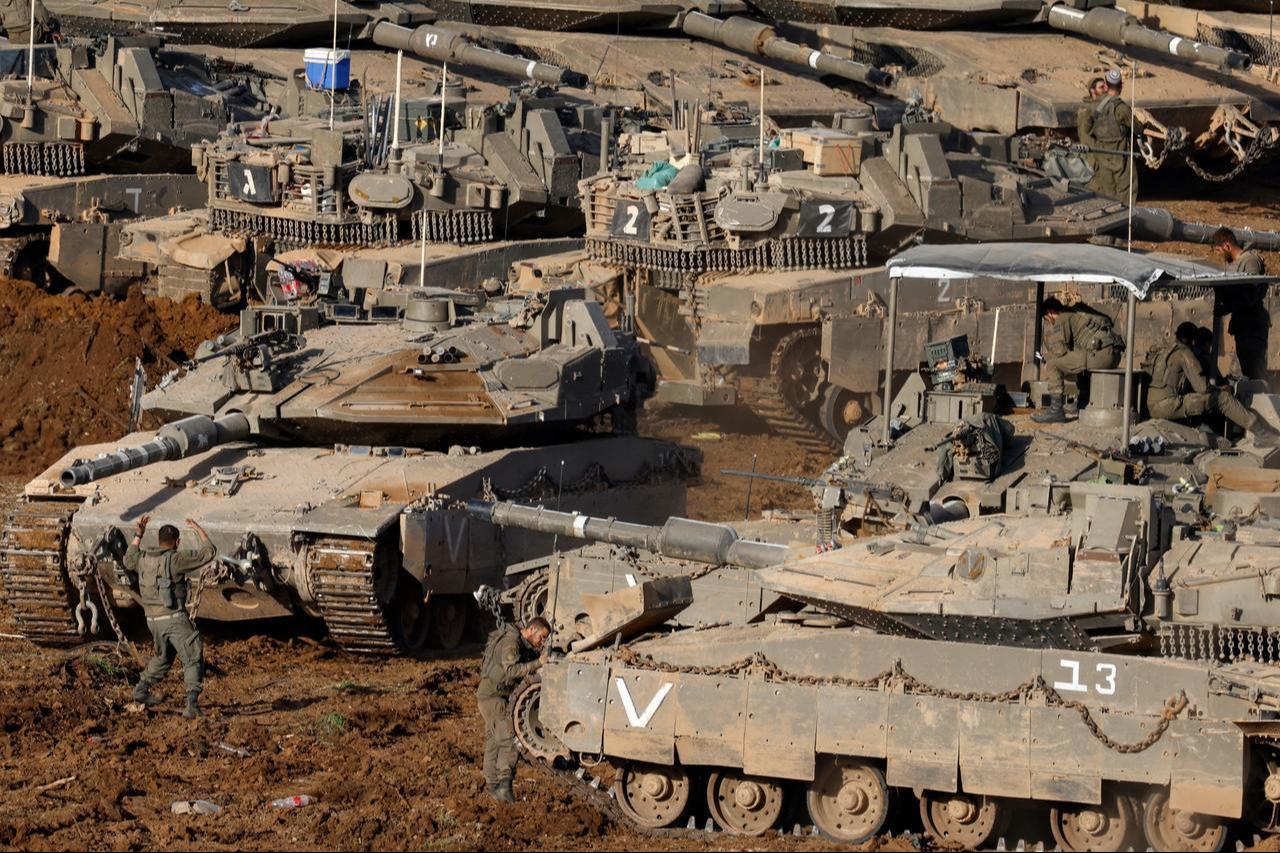 Israeli army tanks deploy at a position in the Upper Galilee in northern Israel near the border with Lebanon on March 12, 2026. (AFP Photo)