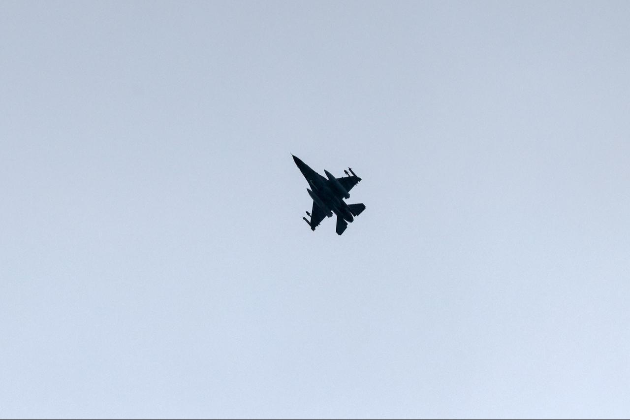 This picture, taken from a position in northern Israel, shows an Israeli Air Force fighter jet flying over the border area with southern Lebanon, March 13, 2026. (AFP Photo)