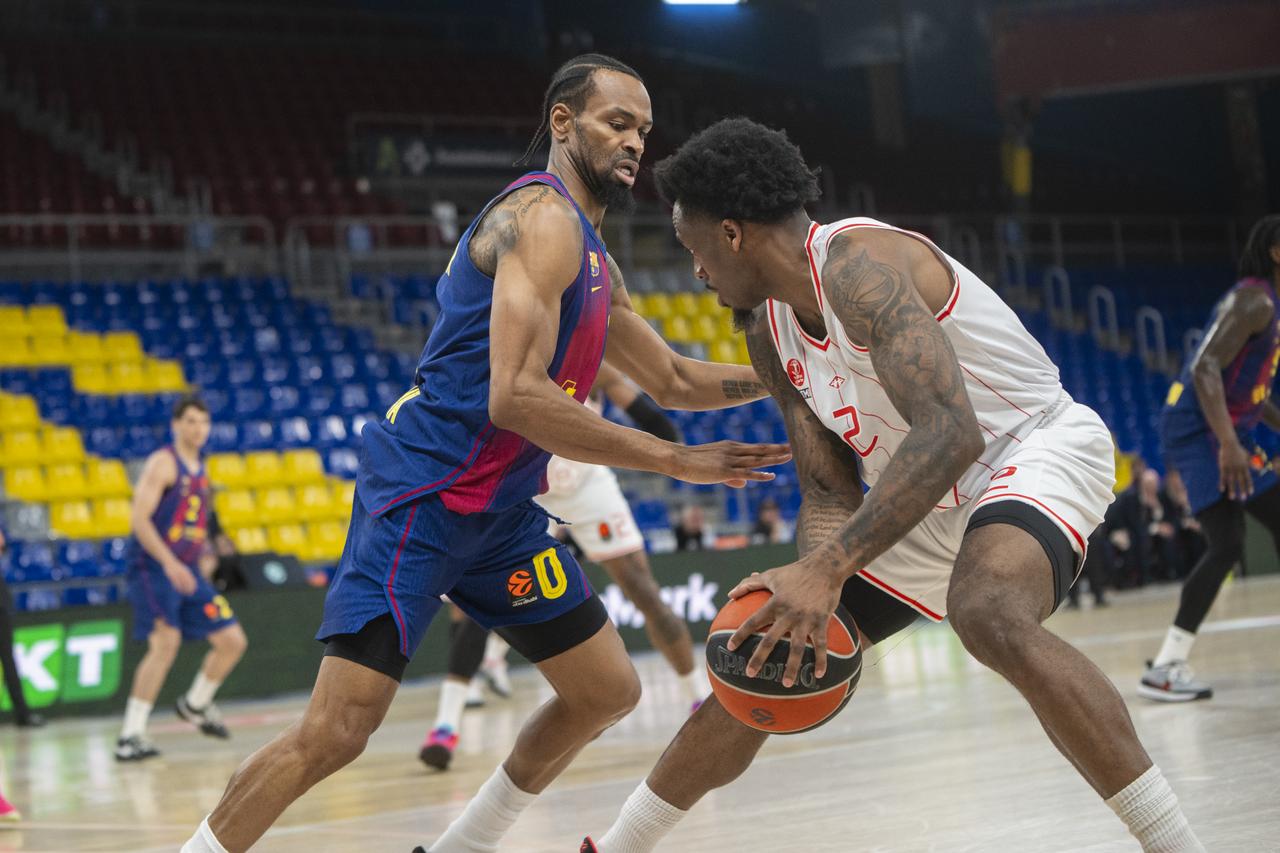 Protests outside, empty stands inside as Hapoel Tel Aviv beat Barca in EuroLeague