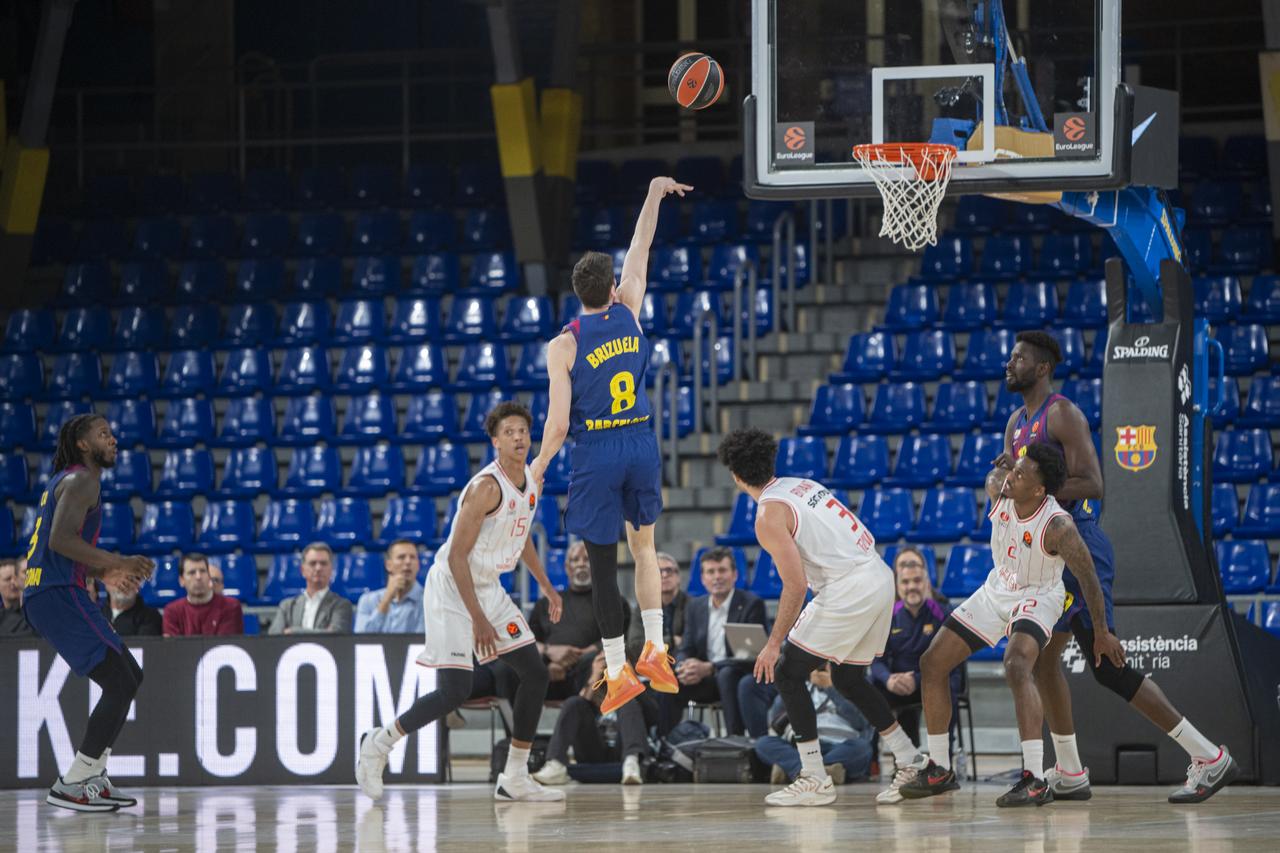 Players compete during EuroLeague match between Hapoel Tel Aviv and Barca played behind closed doors for security reasons at the Palau Blaugrana in Barcelona, Spain, March 13, 2026. (AA Photo)