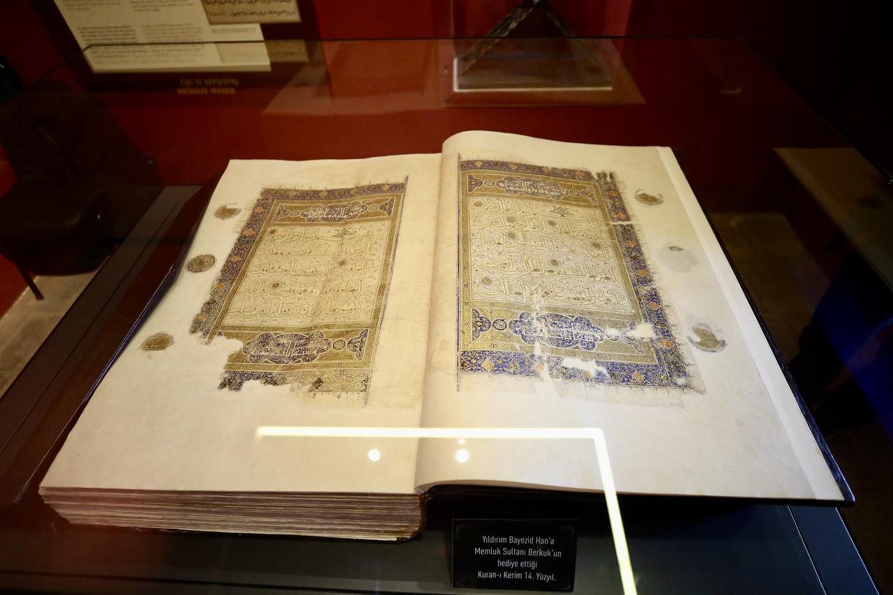 A historic Quran displayed in a glass case at the Turkish and Islamic Arts Museum in Bursa, Türkiye, March 12, 2026. (AA Photo)