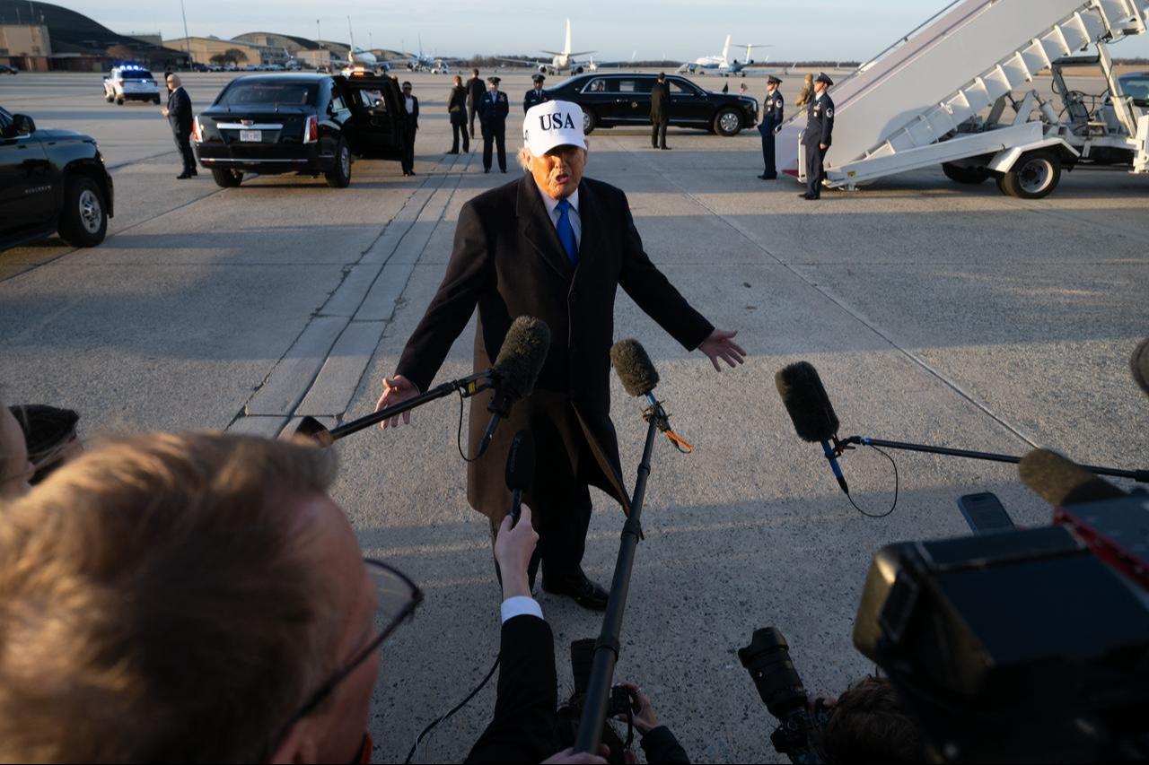 US President Donald Trump speaks to reporters before boarding Air Force One as he departs Joint Base Andrews in Maryland on March 13, 2026. (AFP Photo)