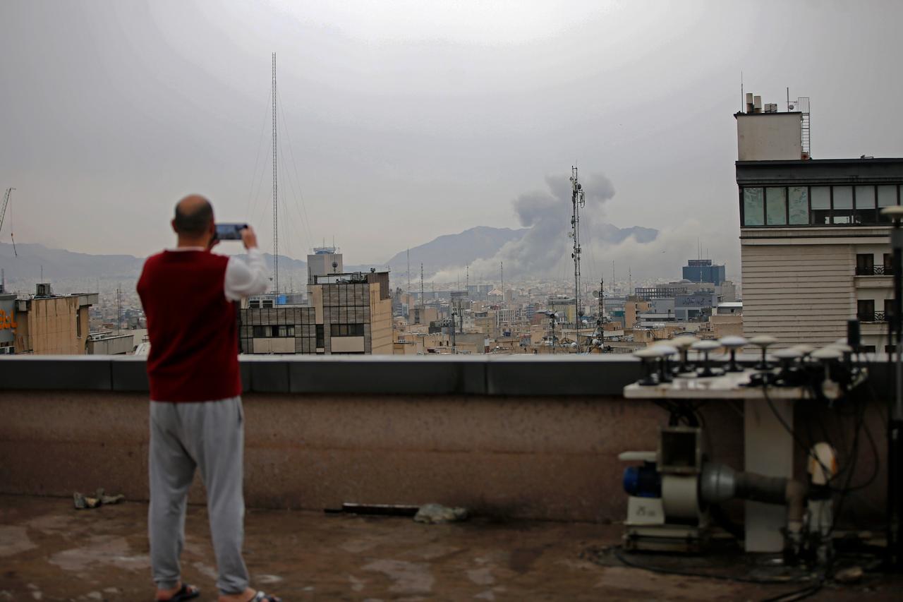 Smoke rises after airstrikes in Tehran, Iran, on March 13, 2026. (AA Photo)