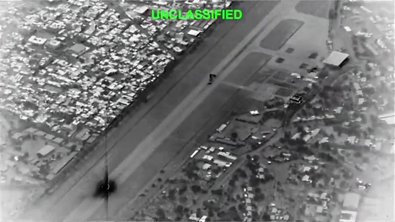 This screenshot, obtained from a video released by US President Donald Trump on his Truth Social account, shows strikes at Kharg Airport, including strikes on the runway and storage facilities. (Photo via Truth Social)