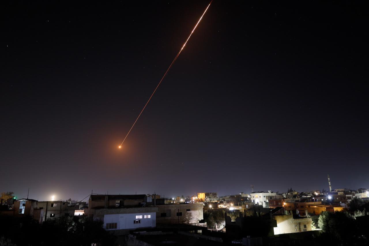 Missiles fired from Iran in response to Israeli attacks are seen over the skies of Daraa, Syria, on March 13, 2026. (AA Photo)