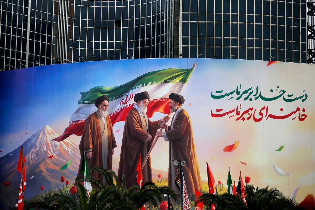 A banner expressing support for Iran’s Supreme Leader Mojtaba Khamenei is displayed at Vali-e Asr Square in Tehran, Iran, March 10, 2026. (AA Photo)