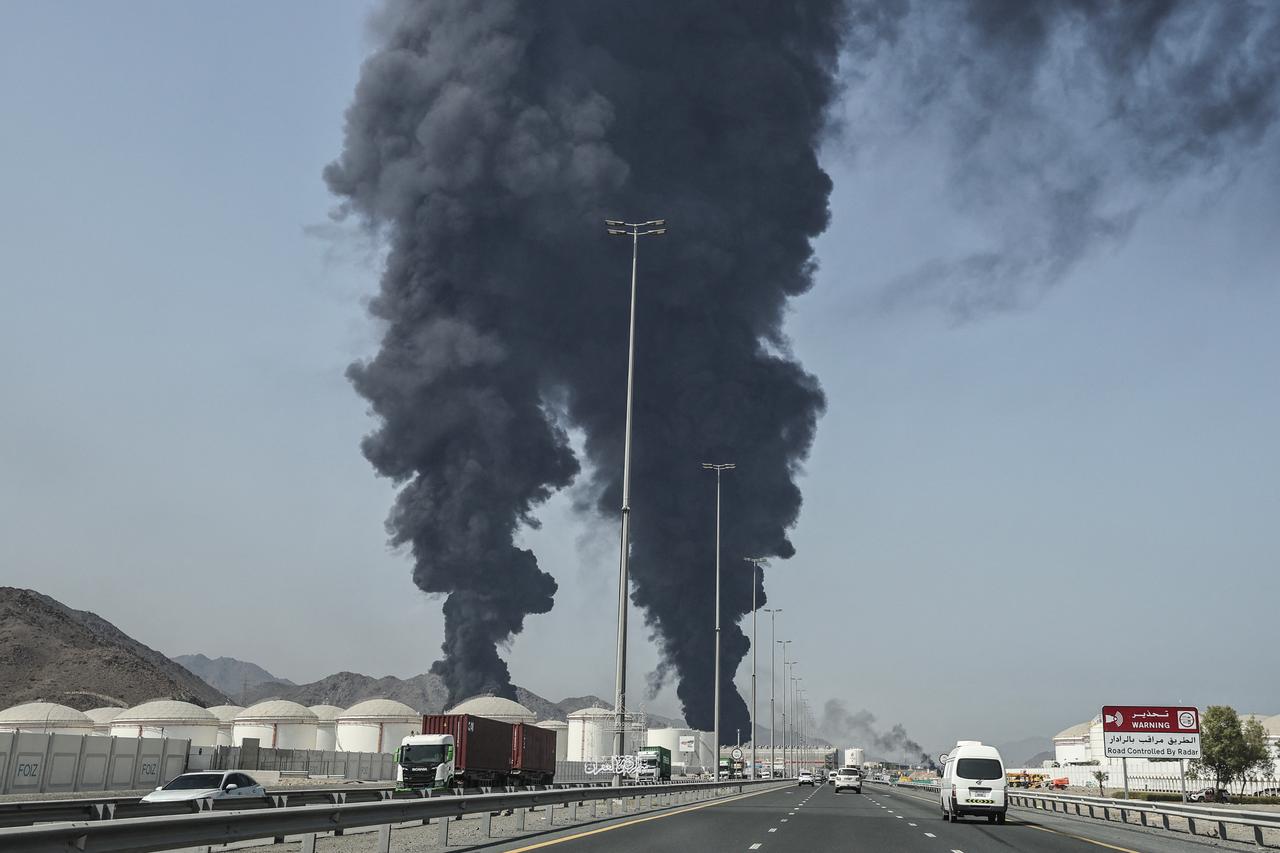 Smoke rises from the direction of an energy installation in the Gulf emirate of Fujairah, March 14, 2026. (AFP Photo)