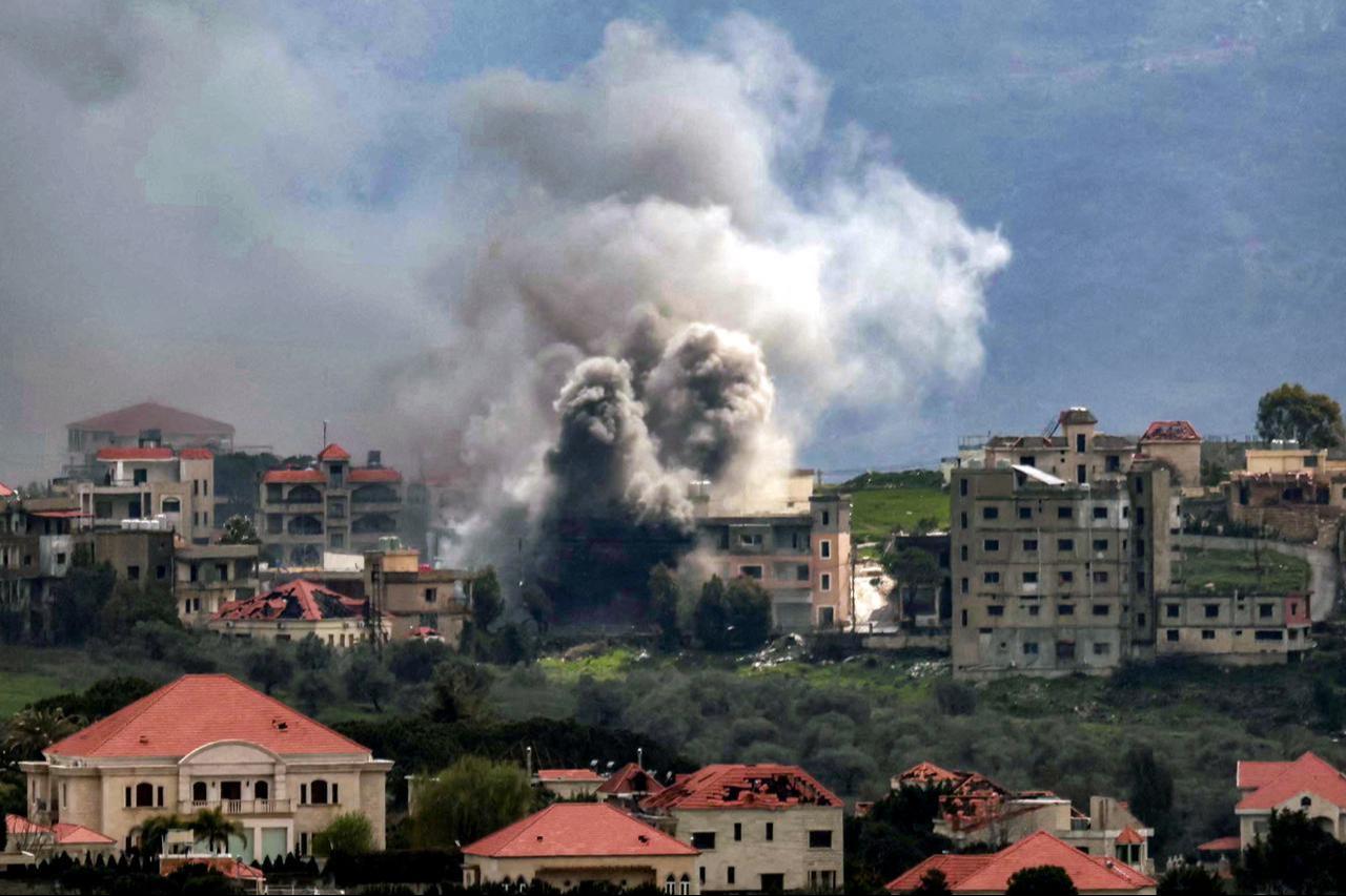 Smoke plumes rise following Israeli bombardment on the village of Khiam in southern Lebanon near the border with Israel, as seen from nearby Marjayoun, March 16, 2026. (AFP Photo)