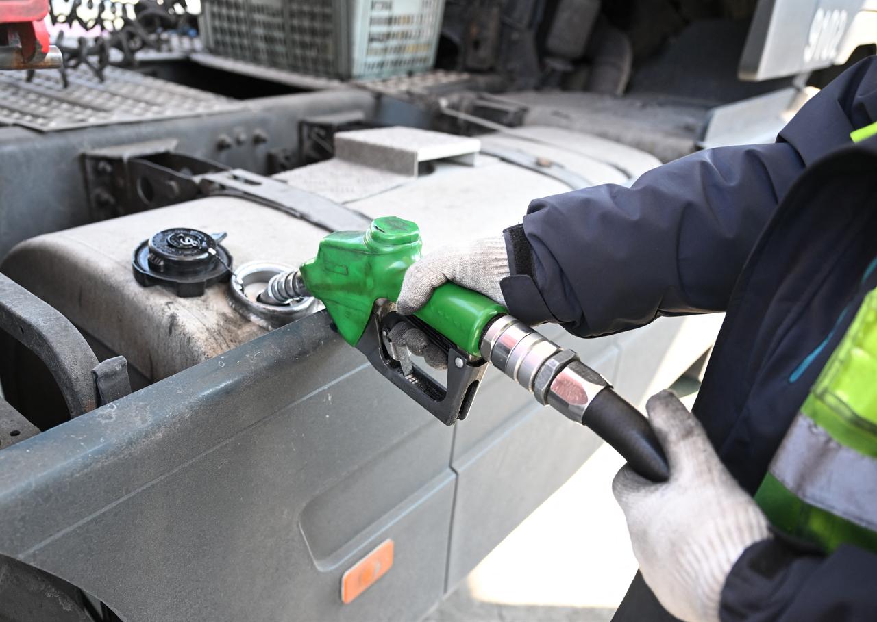 A man fills up a truck at a petrol station of an Inland Container Depot (ICD) terminal in Uiwang on March 13, 2026. (AFP Photo)