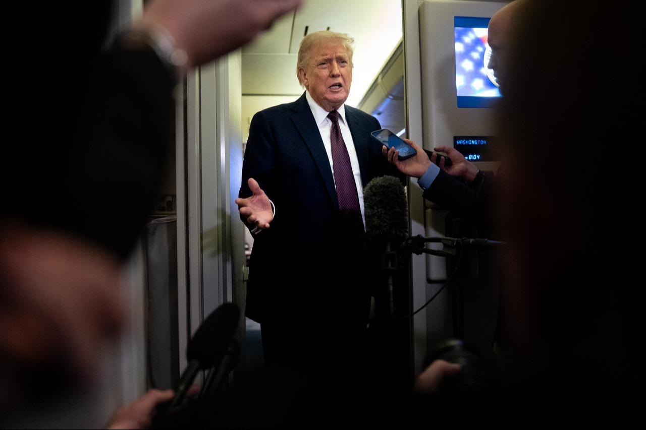U.S. President Donald Trump speaks to members of the media onboard Air Force One on March 15, 2026, while en route to Joint Base Andrews, Maryland. (AFP Photo)
