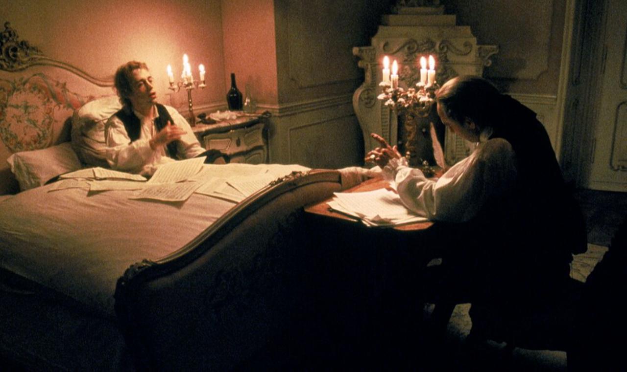Mozart dictates music from his sickbed as Antonio Salieri writes, illustrating their complex relationship in Amadeus (1984), March 17, 2026. (AA Photo)