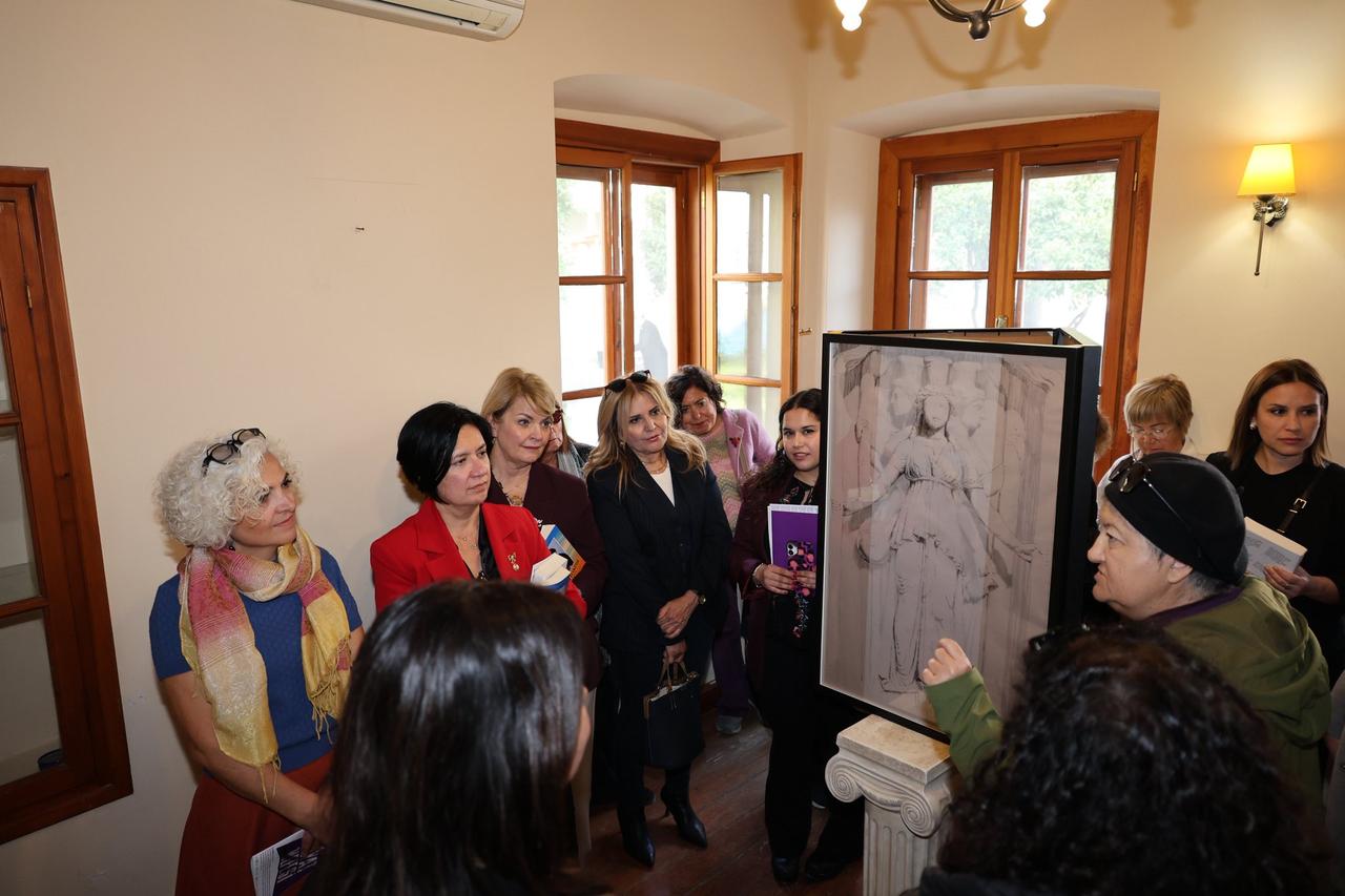 Participants listen to an artist presentation during the opening of the “A Breath of Life” exhibition, Bodrum, Türkiye, March 6, 2026. (Photo via Bodrum Municipality)
