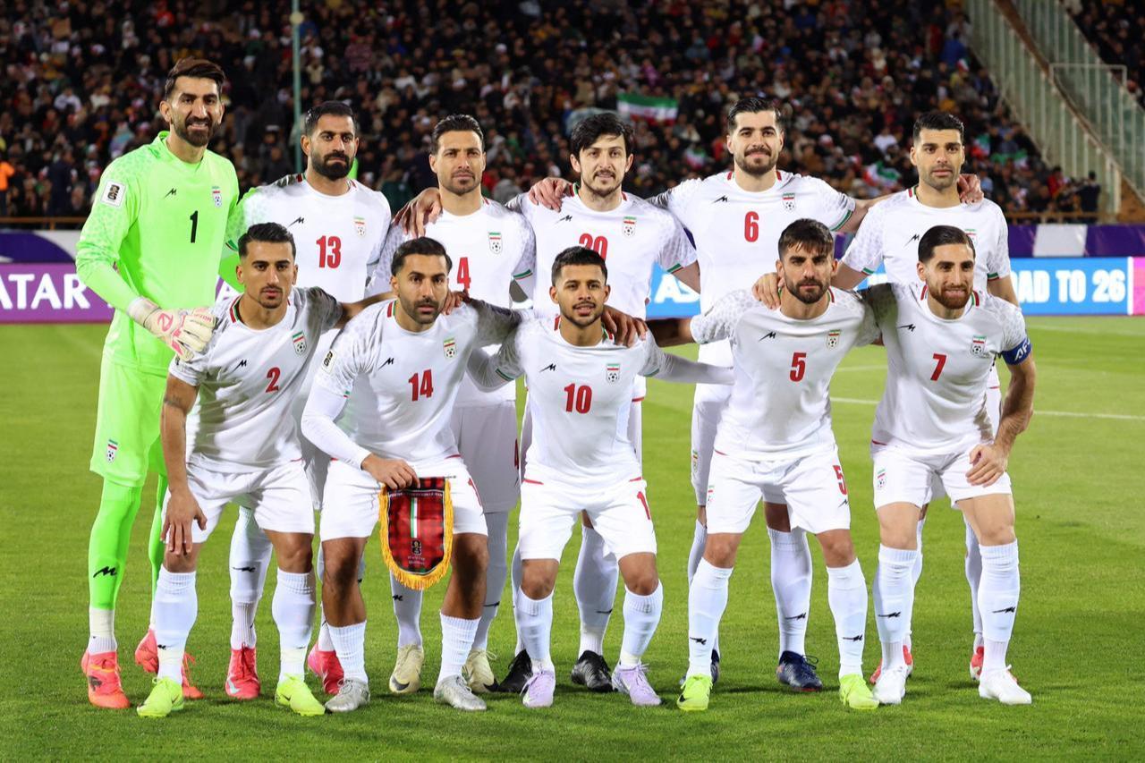 Players of Iran’s national football team gather for a team photo before the FIFA World Cup 2026 Asian qualifiers match against Uzbekistan, March 25, 2025. (AFP Photo)