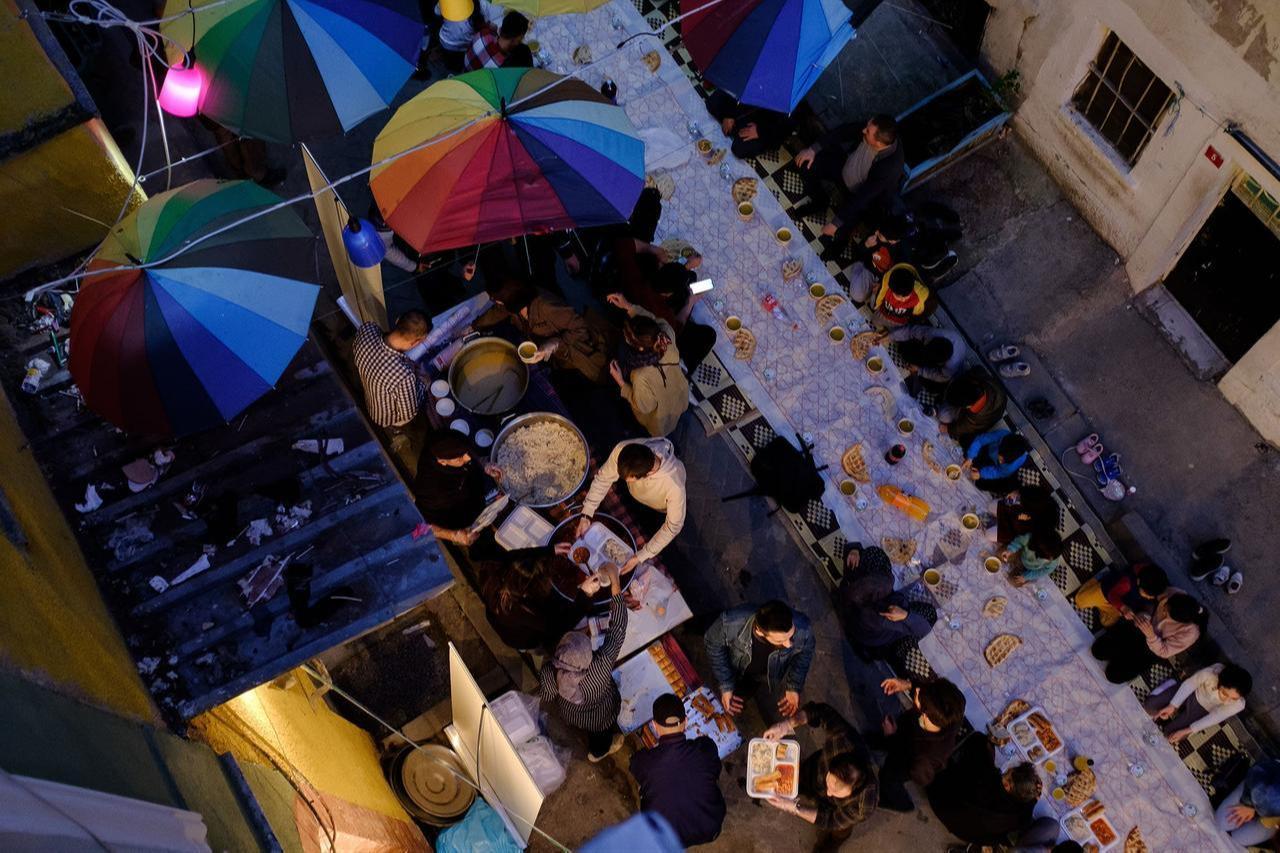 Residents partake in a street iftar in a neighborhood, in Istanbul, Türkiye, April 9, 2022. (AA Photo)