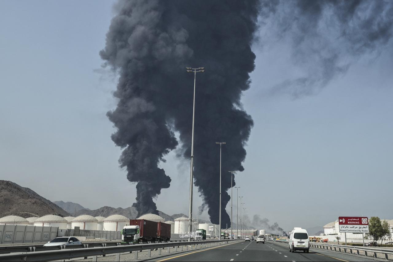 Smoke rises from the direction of an energy installation in the Gulf emirate of Fujairah on March 14, 2026. (AFP Photo)