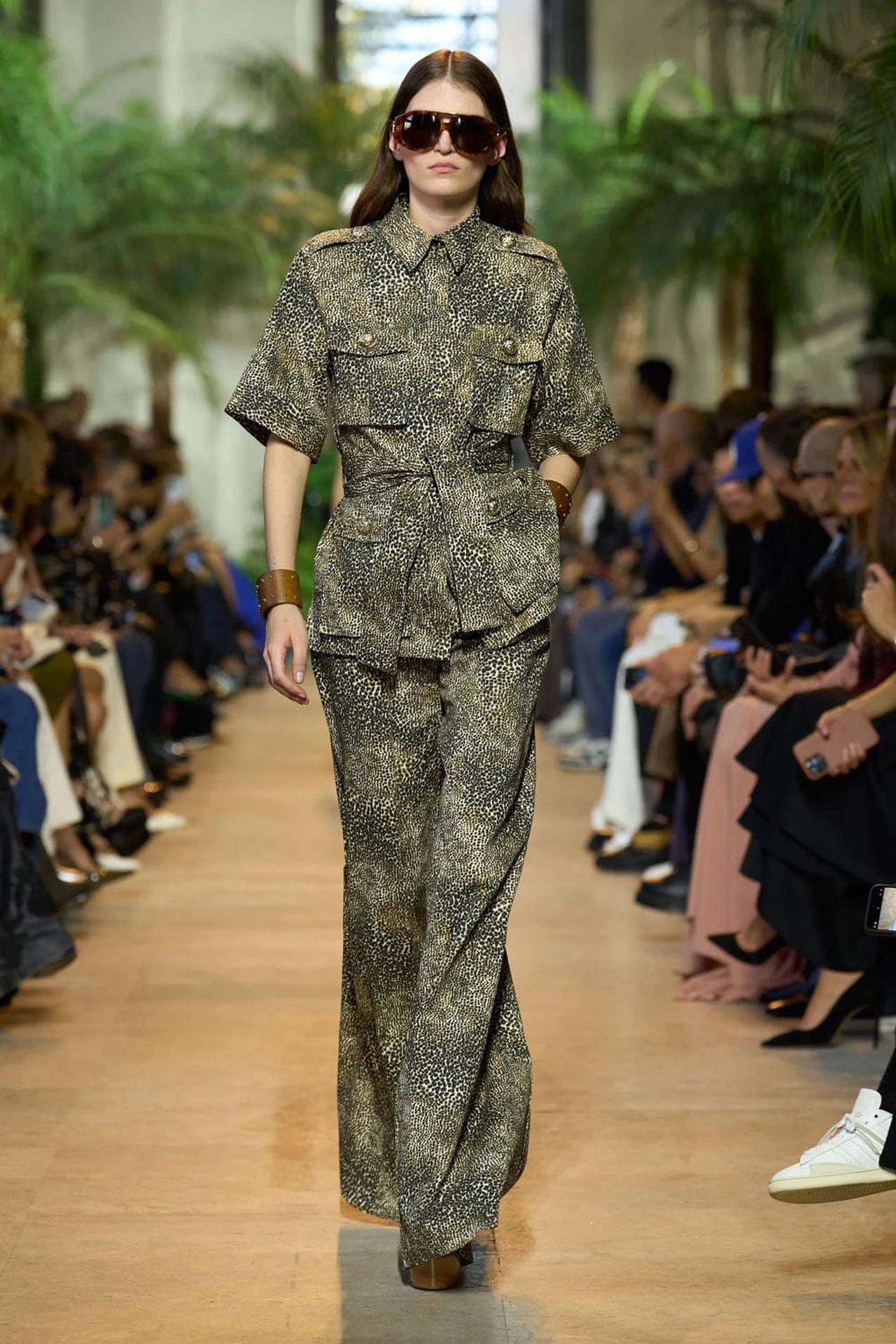 Look from Elie Saab Spring Summer 2025 “Lost in Translation,” featuring a model in camouflage-inspired design. Photo by RUNWAY MAGAZINE.
