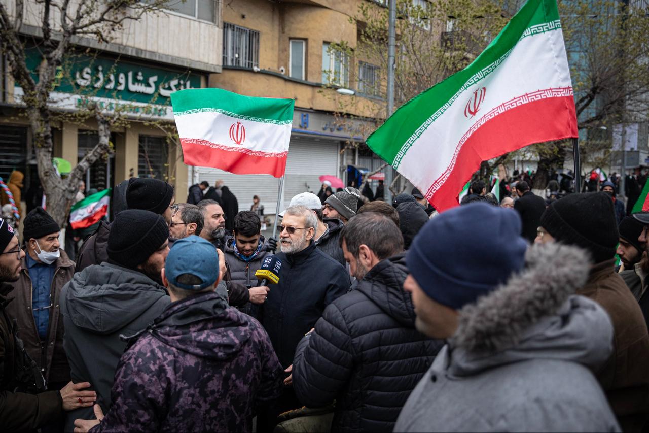 Ali Larijani, secretary of Iran's Supreme National Security Council, speaking to the press, participates in the traditional Quds Day rally in Tehran, March 13, 2026. (Photo via X/@alilarijani_ir)