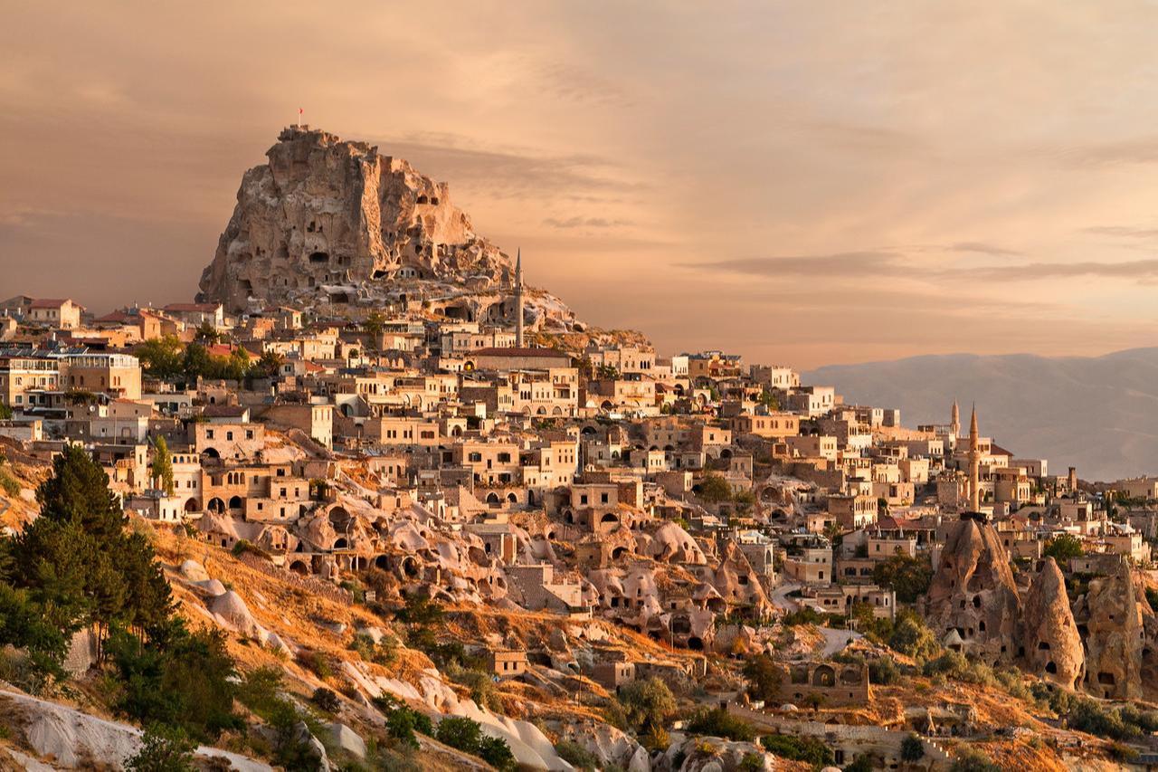 Town of Uchisar at the sunrise, Cappadocia, Türkiye.  (Adobe Stock Photo)