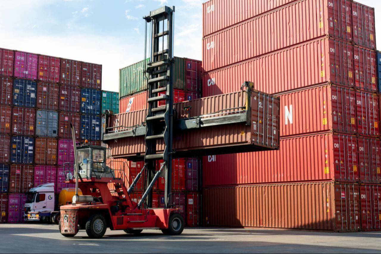 A container handler lifts cargo at a logistics yard in Istanbul, Türkiye, July 7, 2023. (Adobe Stock Photo)
