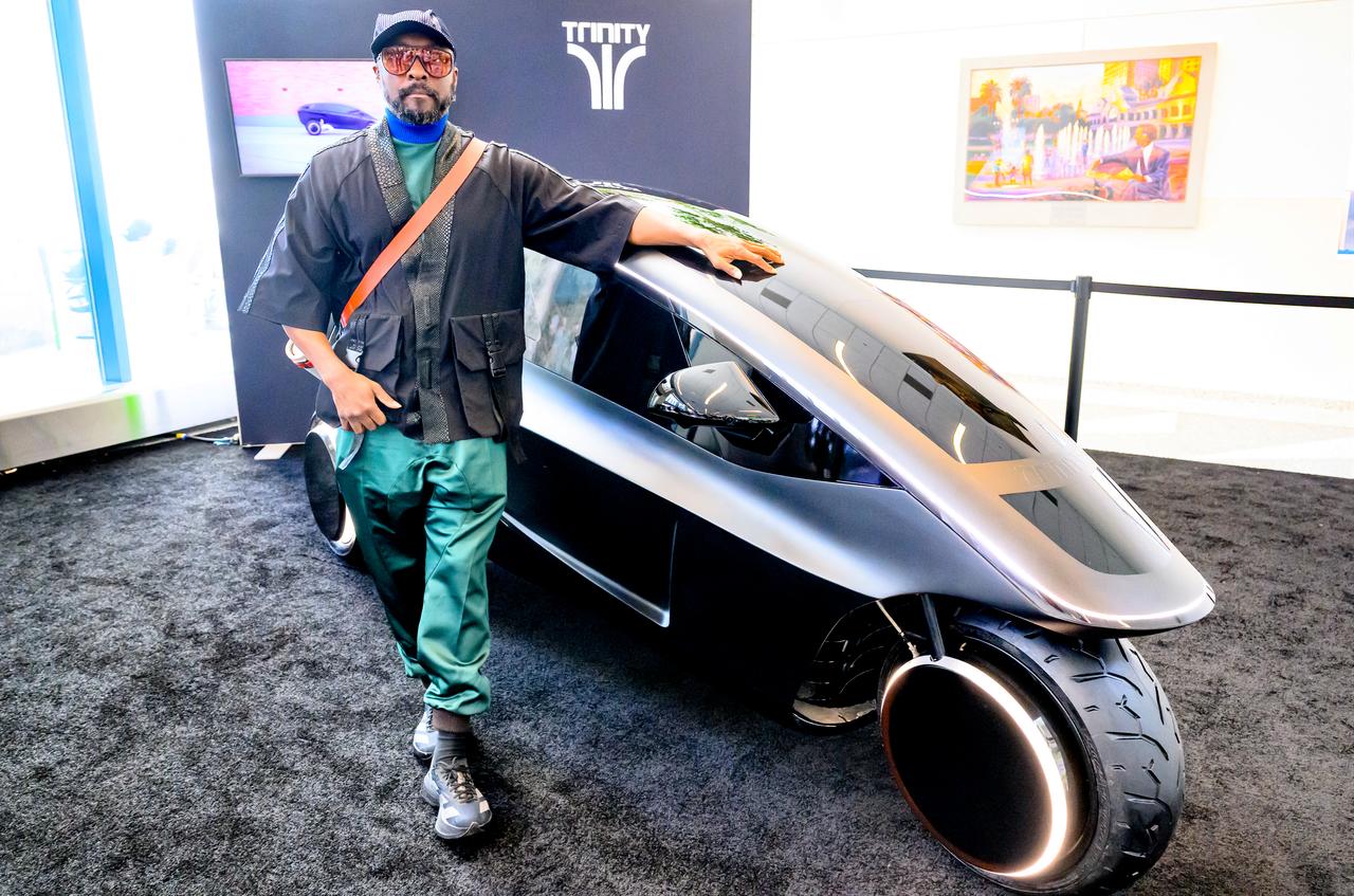 US musician and tech entrepreneur Will.i.am poses with Trinity, an AI-powered electric three-wheeled vehicle, at Nvidia's annual GTC developers conference, in San Jose, California, USA, March 17, 2026. (AFP Photo)