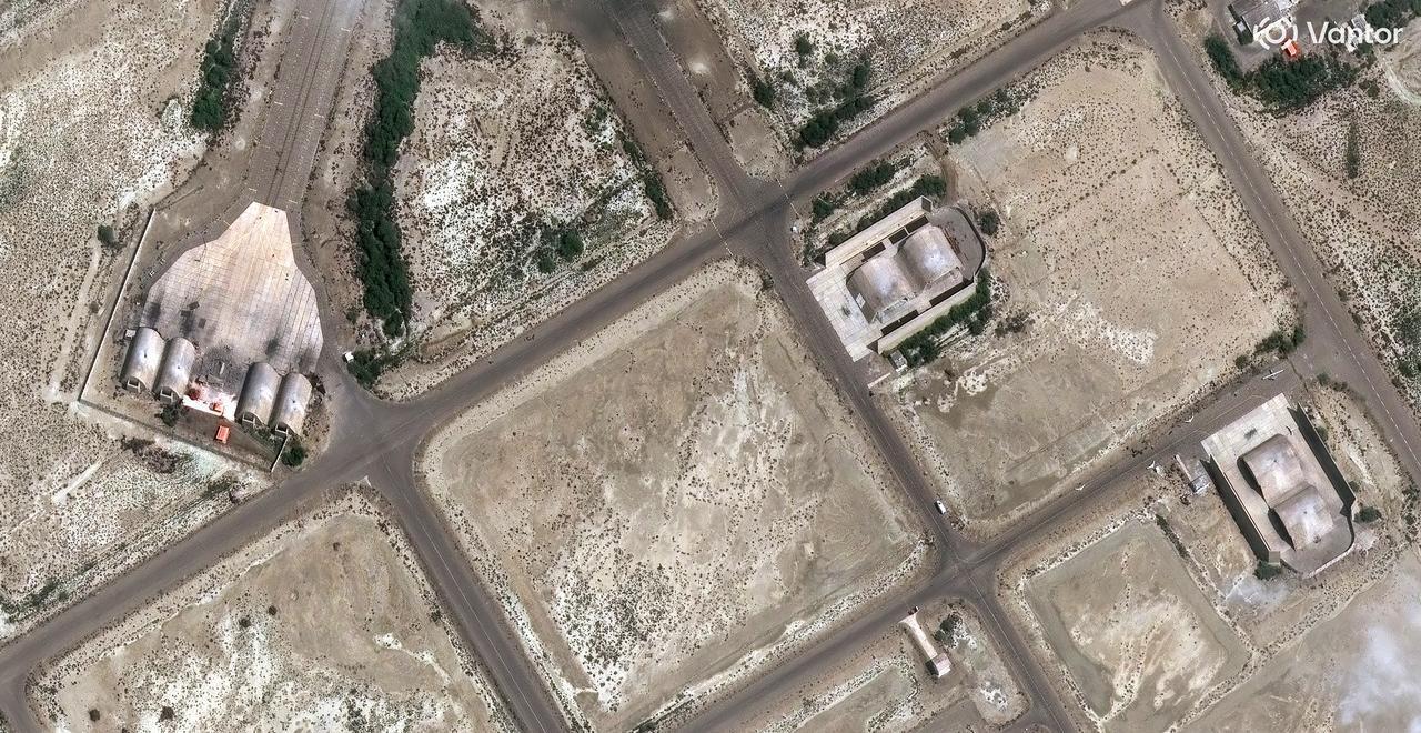 This handout satellite image courtesy of Vantor taken and released on March 1, 2026 shows precision strikes on aircraft shelters at Konarak Naval Base in southern Iran along the Gulf of Oman. (Photo by Satellite image ©2026 Vantor/AFP)