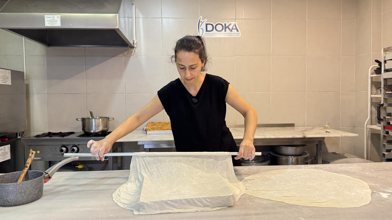 Thin pastry sheets are carefully stretched while preparing Laz boregi, a traditional Black Sea dessert, in Hopa, Artvin, Türkiye, March 1, 2026. (AA Photo)