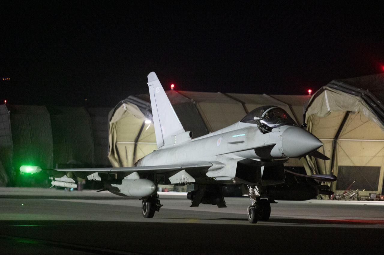 A Royal Air Force Typhoon aircraft on the tarmac returning at RAF Akrotiri on Greek Cyprus after a joint patrol with French aircraft over Syria, January 3, 2025. (Photo by Sgt Lee Goddard/Ministry of Defense (United Kingdom)/AFP)