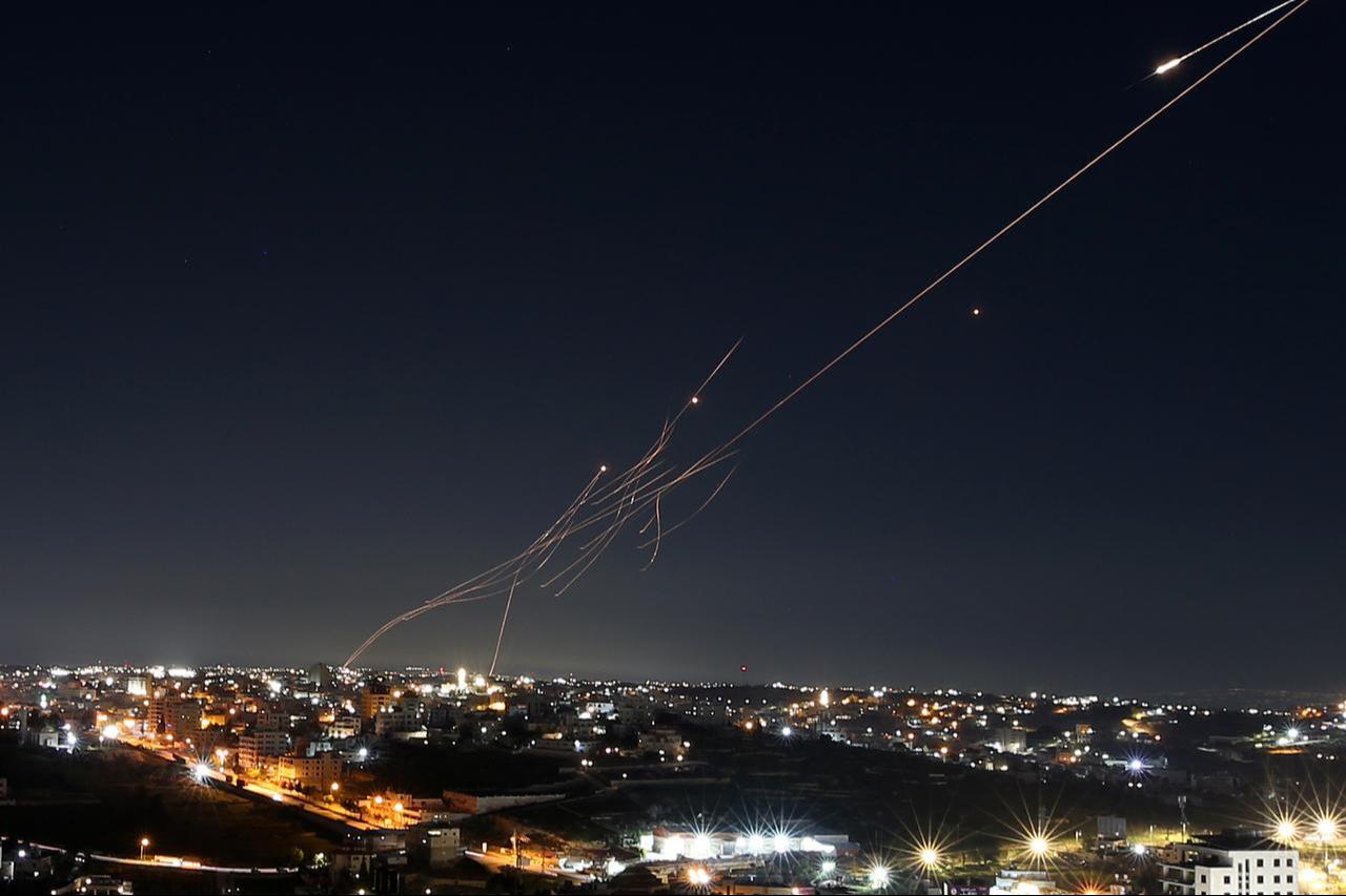 Missiles launched from Iran are seen in the skies over the city of Hebron, West Bank, on March 1, 2026. (AA Photo)